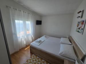 Posteľ alebo postele v izbe v ubytovaní Vacation home Bruna