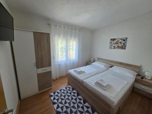 Posteľ alebo postele v izbe v ubytovaní Vacation home Bruna
