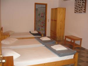 Ein Bett oder Betten in einem Zimmer der Unterkunft Siroco's Rooms And Studios