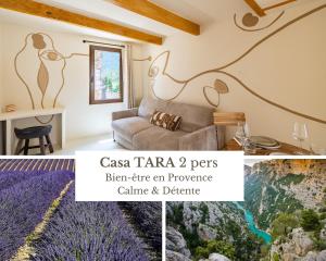 a living room with a couch and a painting on the wall at CASA ANANTA Appartements bien-être aux portes du Verdon Refuge slow Life et sensoriel jusqu à 12 pers in La Garde