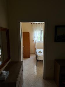 Кровать или кровати в номере Villa Alexandros