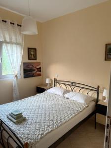 Кровать или кровати в номере Villa Alexandros