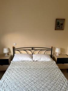 Кровать или кровати в номере Villa Alexandros