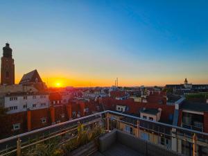 Pohľad na východ alebo západ slnka z apartmánu alebo blízkeho okolia