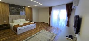 Postel nebo postele na pokoji v ubytování Hotel Pojata