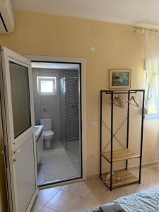 Ванная комната в Villa Alexandros
