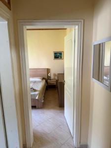 Кровать или кровати в номере Villa Alexandros