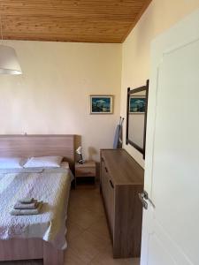 Кровать или кровати в номере Villa Alexandros