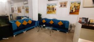 Χώρος καθιστικού στο Savoy Inn Hotel Apartments