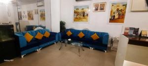 Χώρος καθιστικού στο Savoy Inn Hotel Apartments
