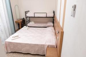 Voodi või voodid majutusasutuse Hotel Gin sul mare toas