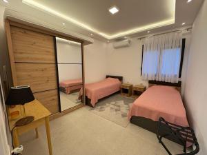 Postel nebo postele na pokoji v ubytování Luxury Villa Ulcinj Štoj