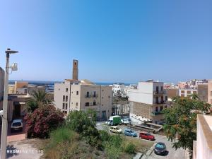 a view of a city with buildings at appartamento celeste in Pantelleria