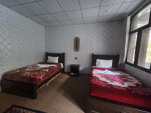 Postel nebo postele na pokoji v ubytování Passu Cones Hotel