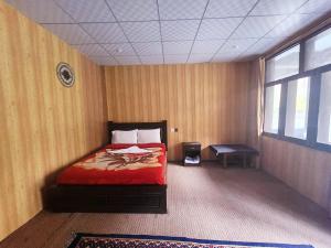 Postel nebo postele na pokoji v ubytování Passu Cones Hotel