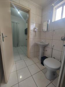 Ένα μπάνιο στο Apartamento em Cacoal - centro