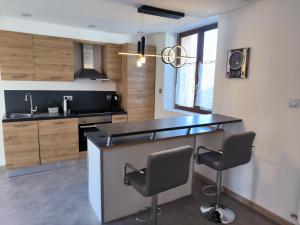 Køkken eller tekøkken på maison de centre ville + 4 billeder