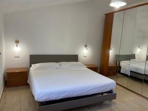 Postel nebo postele na pokoji v ubytování La Petit Maison
