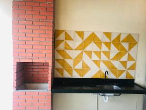 Køkken eller tekøkken på Descanso da Preguiça, as margens do rio preguiça