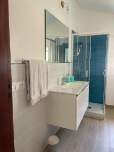 Koupelna v ubytování La Petit Maison + 13 fotografií