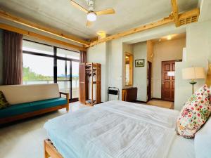 Letto o letti in una camera di Kenting COMIC B&B&SPRING