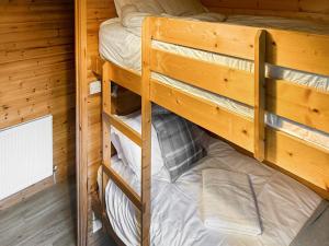 Palanda nebo palandy na pokoji v ubytování Lomond View Lodge + 9 fotografií