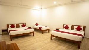 Postel nebo postele na pokoji v ubytování Hotel Sun Suites - A unit of SUN Group - Spacious Rooms - Brand New Building