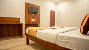 Postel nebo postele na pokoji v ubytování Hotel Sun Suites - A unit of SUN Group - Spacious Rooms - Brand New Building