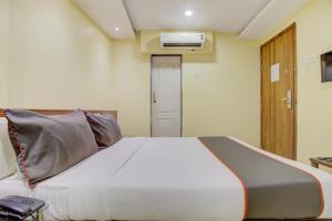 Postel nebo postele na pokoji v ubytování Hotel O Address Inn