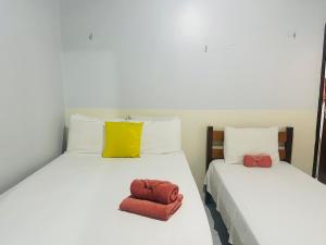 En eller flere senge i et værelse på Descanso da Preguiça, as margens do rio preguiça