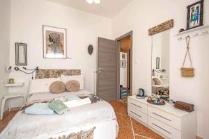Postel nebo postele na pokoji v ubytování MIGU POINT Pisa