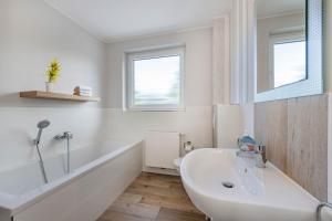 Et badeværelse på Haus Sandkorn + 7 billeder