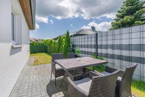 En terrasse eller udendørsområde på Haus Sandkorn