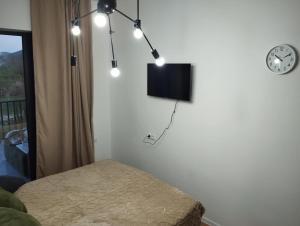 TV a/nebo společenská místnost v ubytování Factor Development