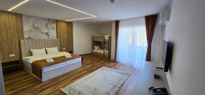 Postel nebo postele na pokoji v ubytování Hotel Pojata