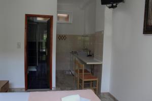 Kuchyň nebo kuchyňský kout v ubytování Apartments Bovan