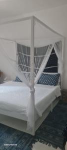 A bed or beds in a room at B&b Boblin blu