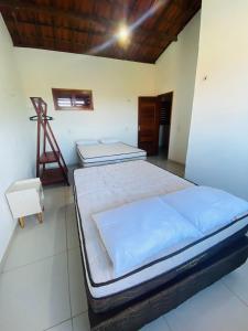 Ein Bett oder Betten in einem Zimmer der Unterkunft Casa Maju