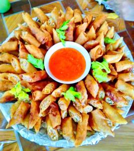 a plate of french fries with a bowl of sauce at Sea-Sky Sky Blue Beach Resort at Malabrigo Lobo Batangas in Lobo