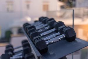 a row of dumbbells sitting on top of a table at Pagoda Lifestyle Hotel in Ischia