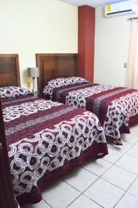 Postel nebo postele na pokoji v ubytování Hotel Topacio + 25 fotografií