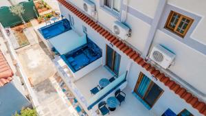 an overhead view of a house with a swimming pool at Vila Orfea in Ksamil