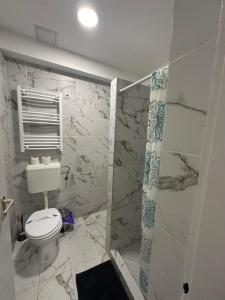 Kúpeľňa v ubytovaní Centrum Panzió