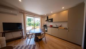 Kuchyň nebo kuchyňský kout v ubytování Charmant appartement proche mer