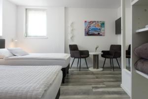 Postel nebo postele na pokoji v ubytování Nefelejcs Vendégház