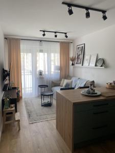 Ένα ή περισσότερα κρεβάτια σε δωμάτιο στο Apartament na Manhattanie