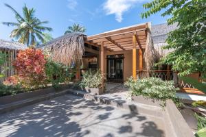 Κήπος έξω από το Slomo House - Siargao