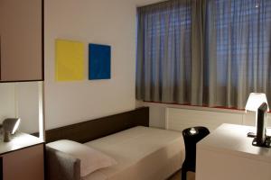 Hotel Garni Centro客房内的一张或多张床位