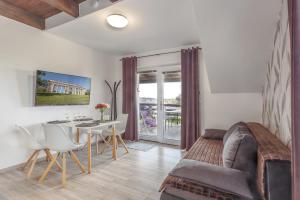 TV a/nebo společenská místnost v ubytování Apartmány pod Pálavou