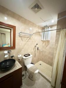 Koupelna v ubytování White Beach Suites Boracay